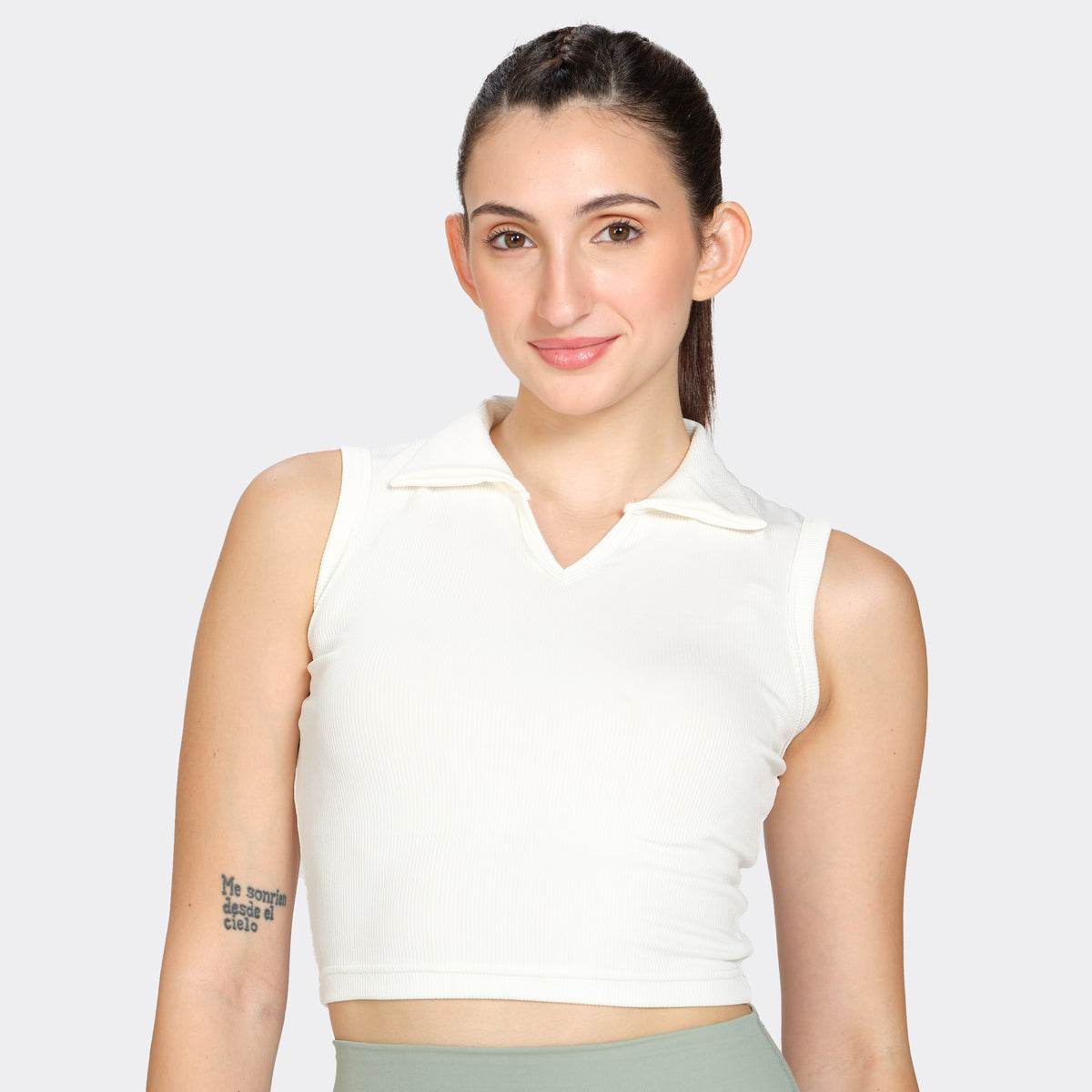 White ribbed polo-neck tank top, front view on model — Munns & Mars