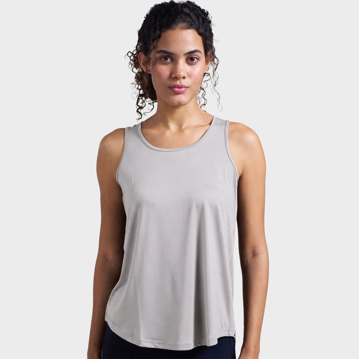 Grey box-pleat active tank top, on model — Munns & Mars
