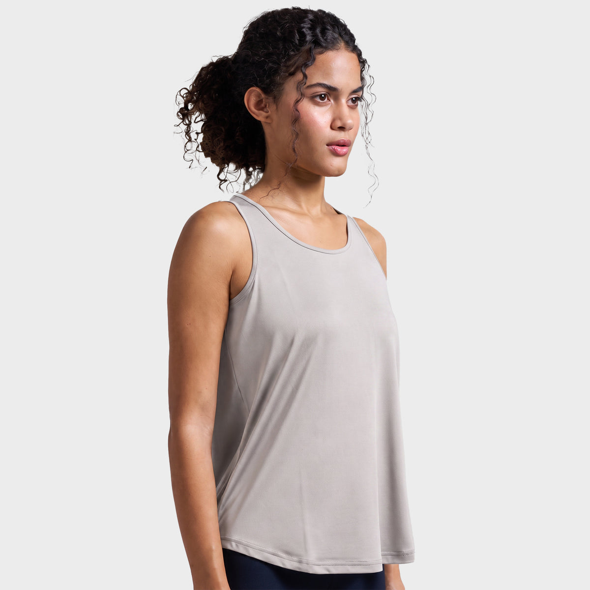 Grey box-pleat active tank top, on model — Munns & Mars