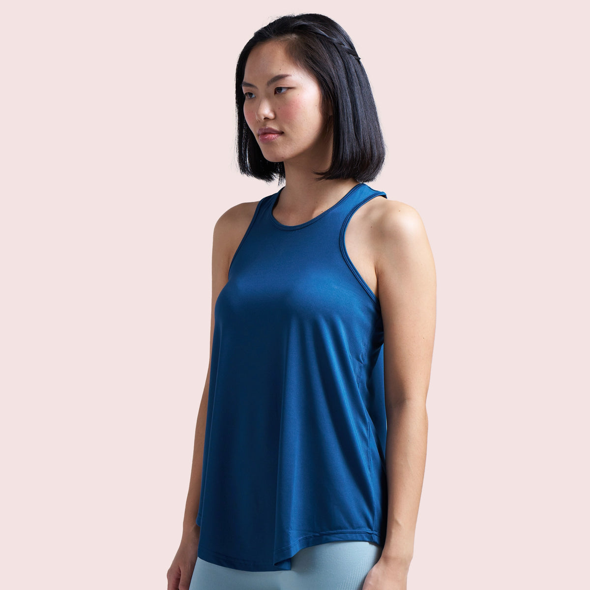 Navy Blue activewear racerback tank top, on model, front pose — Munns & Mars