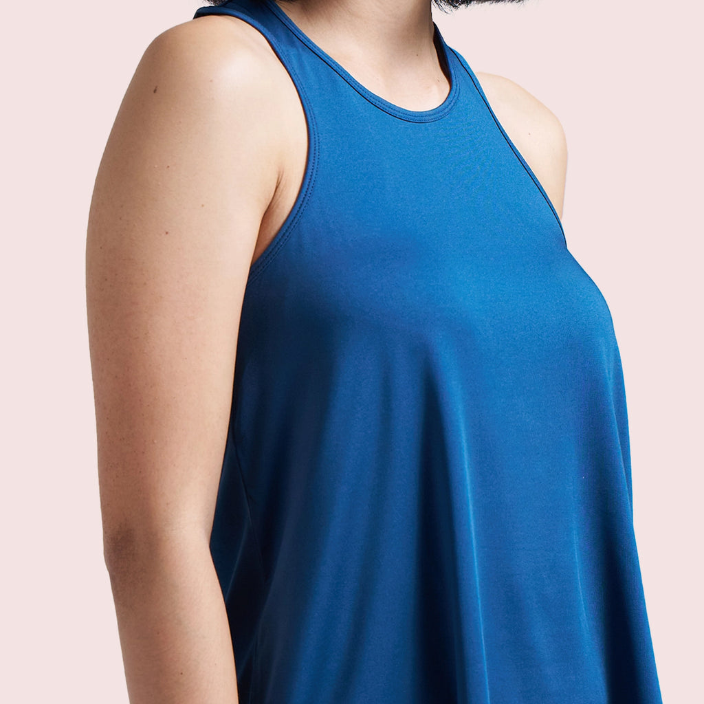Navy Blue activewear racerback tank top, close-up of the neckline and breathable fabric — Munns & Mars