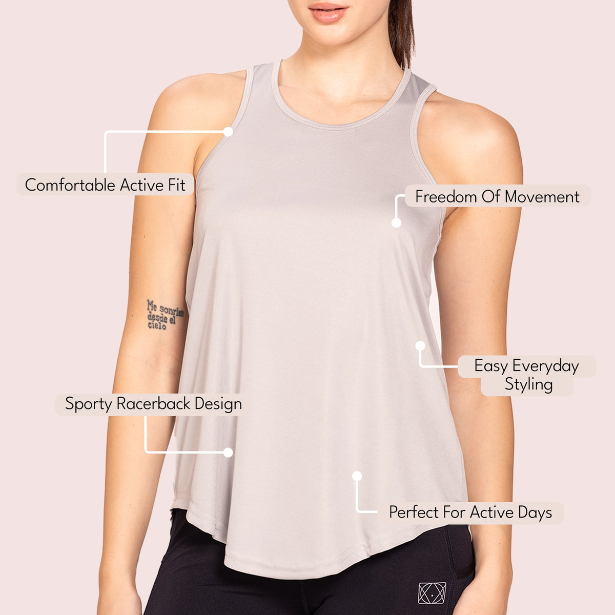 Grey activewear racerback tank top, side view on model — Munns & Mars