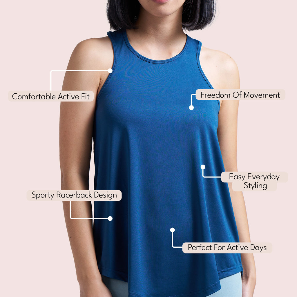 Navy Blue activewear racerback tank top, side view on model — Munns & Mars